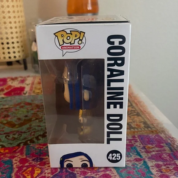 Funko Coraline Doll in Yellow and Blue - Picture 2 of 5